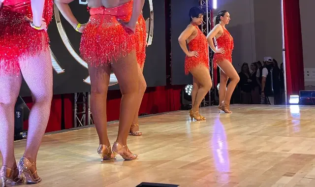 Salsa dance performance video thumbnail with professional dancers